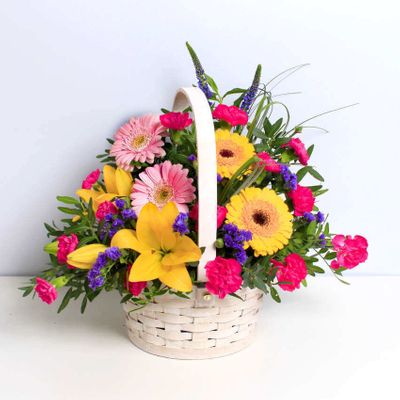 The Arcadia Basket is a colourful combination of seasonal flowers arranged by an expert local florist. It will brighten up anyone's day and will bring a sense joy and happiness to all those who receive this classic basket design. 