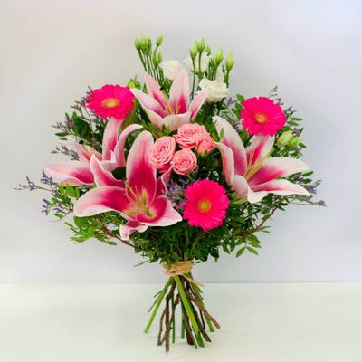 Sweet Memories is a beautiful pink flower bouquet that you can give to someone special. Bring a smile to their face and brighten up their day with this bouquet with pink lilies and roses.