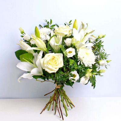Timeless Whites this simple but classical arrangement makes a lovely gift. Send this white combination to make every celebration more delightful.